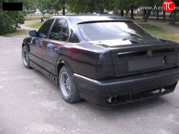 4 999 р. Накладка на задний бампер Rieger BMW 5 серия E34 седан дорестайлинг (1988-1994)  с доставкой в г. Пермь