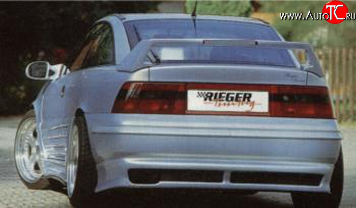 4 499 р. Накладка заднего бампера Rieger Opel Calibra A (1990-1997)  с доставкой в г. Пермь