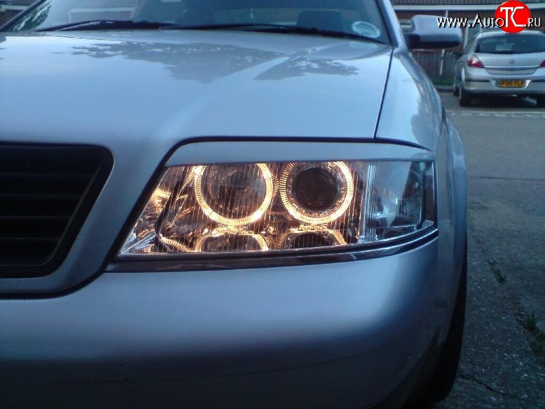 1 399 р. Комплект ресничек на фары Sport (дорестайлинг, до 2001 г.) Audi A6 C5 дорестайлинг, седан (1997-2001) (Неокрашенные)  с доставкой в г. Пермь