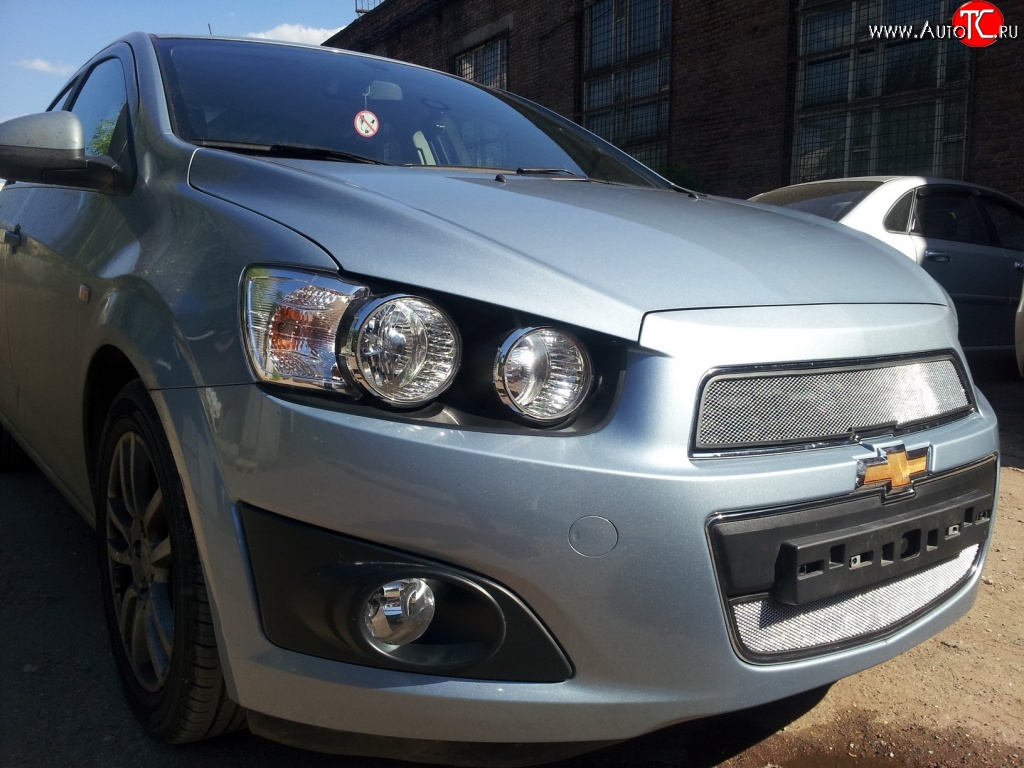1 539 р. Нижняя сетка на бампер Russtal (хром) Chevrolet Aveo T300 седан (2011-2015)  с доставкой в г. Пермь