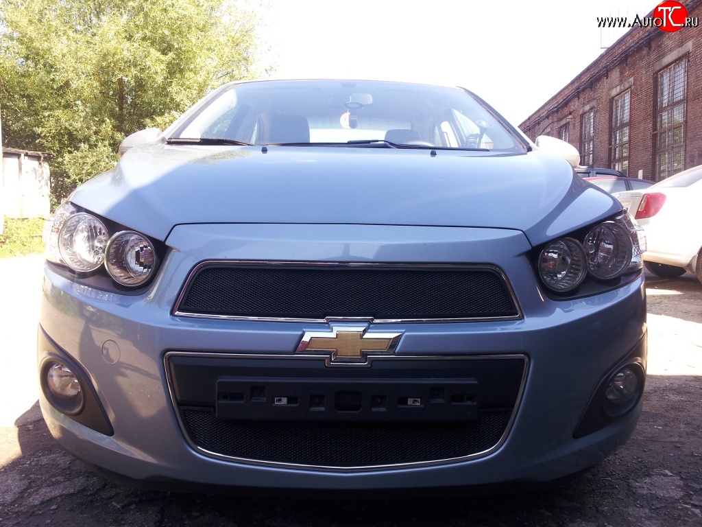 1 469 р. Нижняя сетка на бампер Russtal (черная) Chevrolet Aveo T300 седан (2011-2015)  с доставкой в г. Пермь