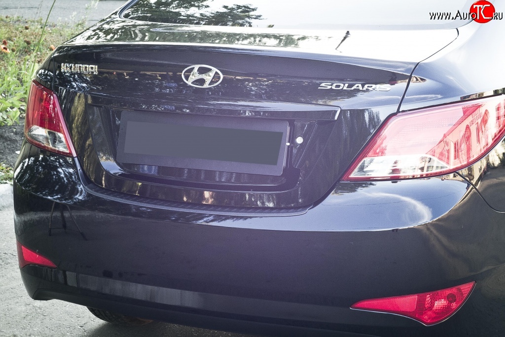 1 179 р. Накладка на верхнюю часть заднего бампера RA  Hyundai Solaris  RBr (2014-2017) седан рестайлинг  с доставкой в г. Пермь