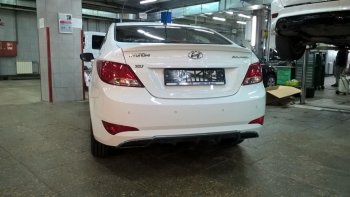 3 899 р. Накладка на задний бампер АвтоКрат  Hyundai Solaris  RBr (2014-2017) седан рестайлинг (Неокрашенная)  с доставкой в г. Пермь. Увеличить фотографию 3