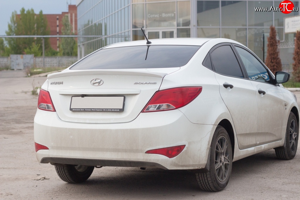 2 899 р. Лип спойлер Кураж средний  Hyundai Solaris  RBr (2014-2017) седан рестайлинг (Неокрашенный)  с доставкой в г. Пермь