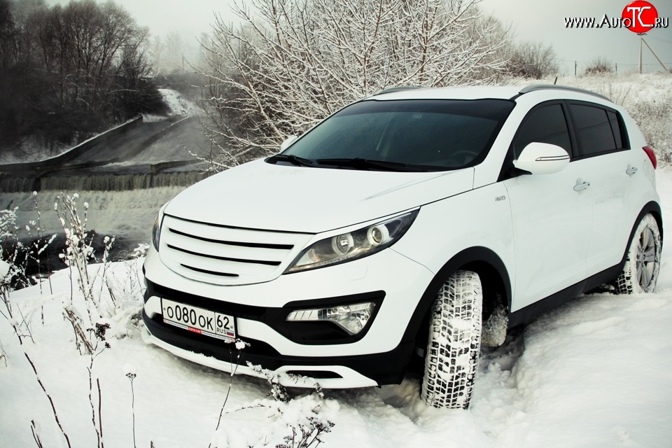 5 399 р. Накладка на передний бампер Ixion Style  KIA Sportage  3 SL (2010-2014) дорестайлинг (Неокрашенная)  с доставкой в г. Пермь