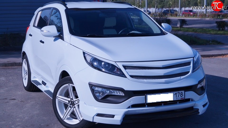 7 799 р. Накладка на передний бампер JSW Style  KIA Sportage  3 SL (2010-2014) дорестайлинг (Неокрашенная)  с доставкой в г. Пермь