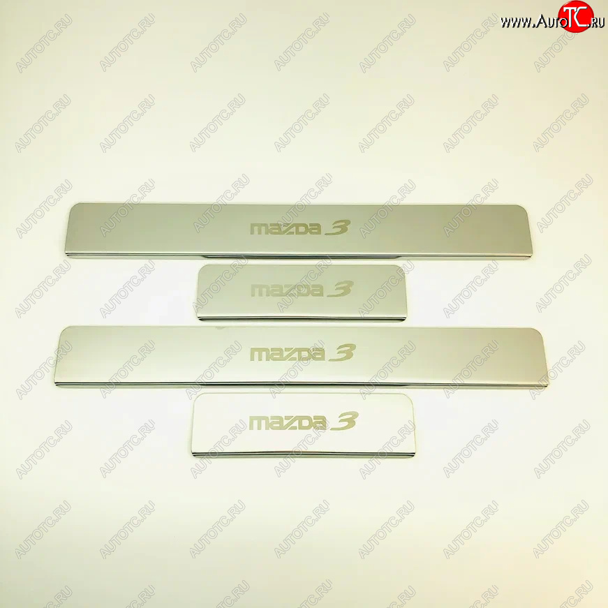 2 179 р. Накладки порожков салона INOX  Mazda 3/Axela  BM (2013-2019) дорестайлинг седан, дорестайлинг, хэтчбэк, рестайлинг седан, рестайлинг, хэтчбэк (Нержавеющая сталь)  с доставкой в г. Пермь