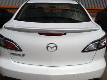 3 899 р. Лип спойлер MV-Tuning Mazda 3/Axela BL дорестайлинг седан (2009-2011) (Неокрашенный)  с доставкой в г. Пермь. Увеличить фотографию 3