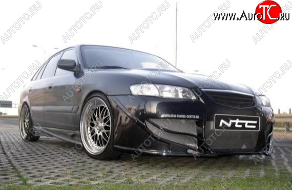 25 899 р. Передний бампер NTC Mazda 626 GF дорестайлинг седан (1997-1999)  с доставкой в г. Пермь