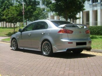 7 499 р. Накладка заднего бампера Zodiak (под одинарный выхлоп) MV-Tuning Mitsubishi Lancer 10 CY седан рестайлинг (2011-2017) (Неокрашенная)  с доставкой в г. Пермь. Увеличить фотографию 3