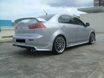 7 499 р. Накладка заднего бампера Zodiak (под одинарный выхлоп) MV-Tuning Mitsubishi Lancer 10 CY седан рестайлинг (2011-2017) (Неокрашенная)  с доставкой в г. Пермь. Увеличить фотографию 4