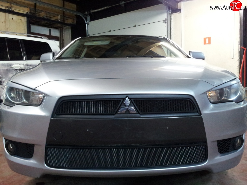 2 759 р. Сетка на бампер Russtal (черная) Mitsubishi Lancer 10 CY седан рестайлинг (2011-2017)  с доставкой в г. Пермь