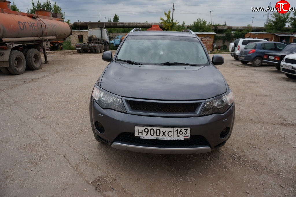 5 449 р. Решётка радиатора (рестайлинг) Sport Mitsubishi Outlander XL (CW)  рестайлинг (2010-2013) (Неокрашенная)  с доставкой в г. Пермь