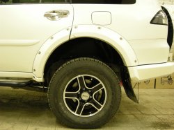 15 349 р. Накладки на колёсные арки BUSHWACKER Mitsubishi Pajero Sport PB дорестайлинг (2008-2013) (Неокрашенные)  с доставкой в г. Пермь. Увеличить фотографию 3