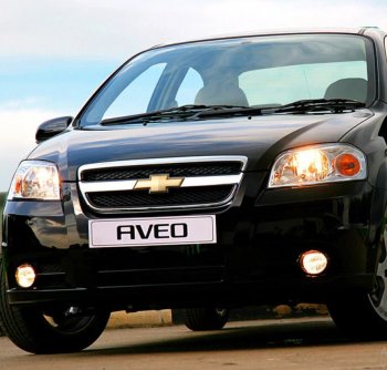 Бампер передний (с отверстиями под ПТФ) GAMMA Chevrolet Aveo  T250 (2006-2011) седан рестайлинг