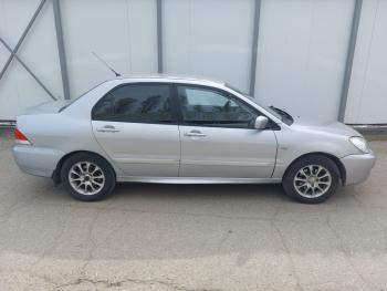 3 499 р. Пластиковые накладки порогов Фанат Тюнинг  Mitsubishi Lancer  9 CS (2000-2009) седан дорестайлинг, седан 1-ый рестайлинг, универсал 1-ый рестайлинг, седан 2-ой рестайлинг, универсал 2-ой рестайлинг (неокрашенные (глянец под окраску))  с доставкой в г. Пермь. Увеличить фотографию 2