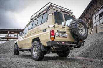 100 649 р. Бампер РИФ силовой задний Toyota Land Cruiser 78 2007+ с квадратом под фаркоп, калиткой и фонарями РИФ rif078-21125  с доставкой в г. Пермь. Увеличить фотографию 2