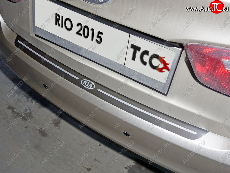 2 999 р. Накладка на задний бампер, ТСС Тюнинг  KIA Rio  3 QB (2015-2017) рестайлинг седан, хэтчбек 5 дв. рестайлинг (лист шлифованный надпись RIO)  с доставкой в г. Пермь