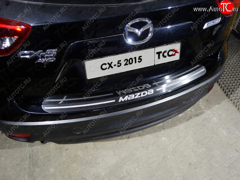 3 999 р. Накладка на задний бампер, ТСС Тюнинг  Mazda CX-5  KE (2015-2017) рестайлинг (лист шлифованный надпись MAZDA)  с доставкой в г. Пермь