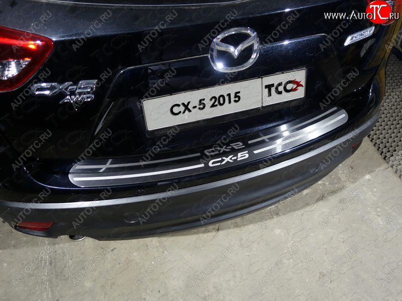 3 999 р. Накладка на задний бампер, ТСС Тюнинг  Mazda CX-5  KE (2015-2017) рестайлинг (лист шлифованный надпись CX-5)  с доставкой в г. Пермь