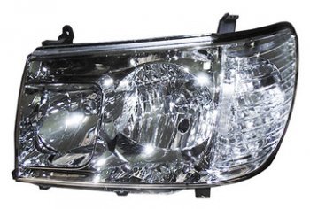 Левая фара (c электрокорректором) BODYPARTS Toyota Land Cruiser  100 (2005-2007) 2-ой рестайлинг