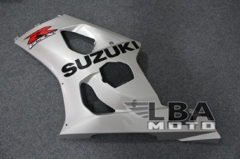 6 899 р. Левый боковой пластик для Suzuki GSX-R 1000 03-04 Без цвета  пм-00000441  с доставкой в г. Пермь. Увеличить фотографию 1