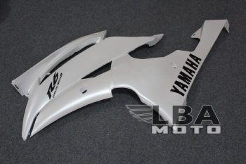 8 199 р. Левый нижний боковой пластик для Yamaha R6 08-14 Без цвета  пм-00000552  с доставкой в г. Пермь. Увеличить фотографию 1