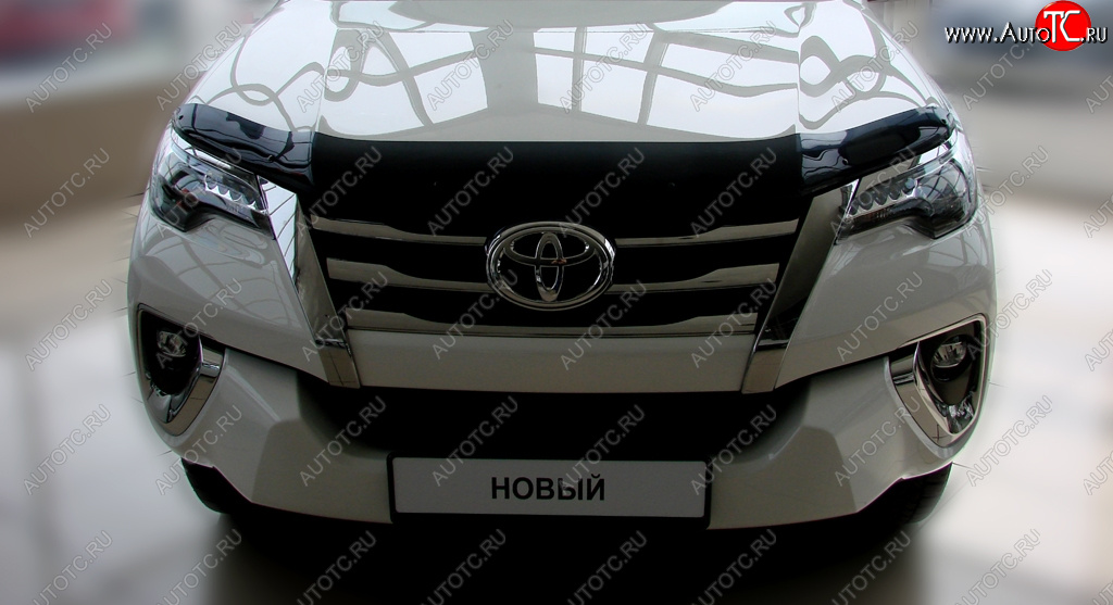 3 689 р. Дефлектор капота SIM Toyota Fortuner AN160 дорестайлинг (2015-2020)  с доставкой в г. Пермь