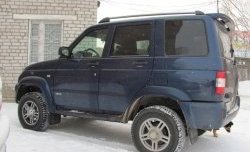 7 399 р. Рейлинги Ралекс-Тюнинг  Уаз Патриот  Спорт (2012-2013) (Нагрузка до 100 кг (усиленные кронштейны башмаков 4 штуки) (2 башмака))  с доставкой в г. Пермь. Увеличить фотографию 2