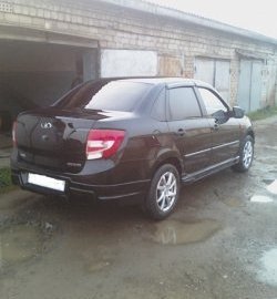 2 749 р. Накладка Sport-Style на задний бампер  Лада Гранта  2190 (2011-2017) седан дорестайлинг (Неокрашенная)  с доставкой в г. Пермь. Увеличить фотографию 2