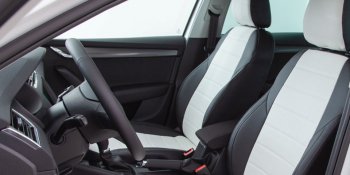 6 999 р. Чехлы Seintex (экокожа, 40/60, Airbag)  Лада Веста ( 2180,  SW 2181) - Веста Кросс ( 2181,  2180) (черный/белый)  с доставкой в г. Пермь. Увеличить фотографию 2